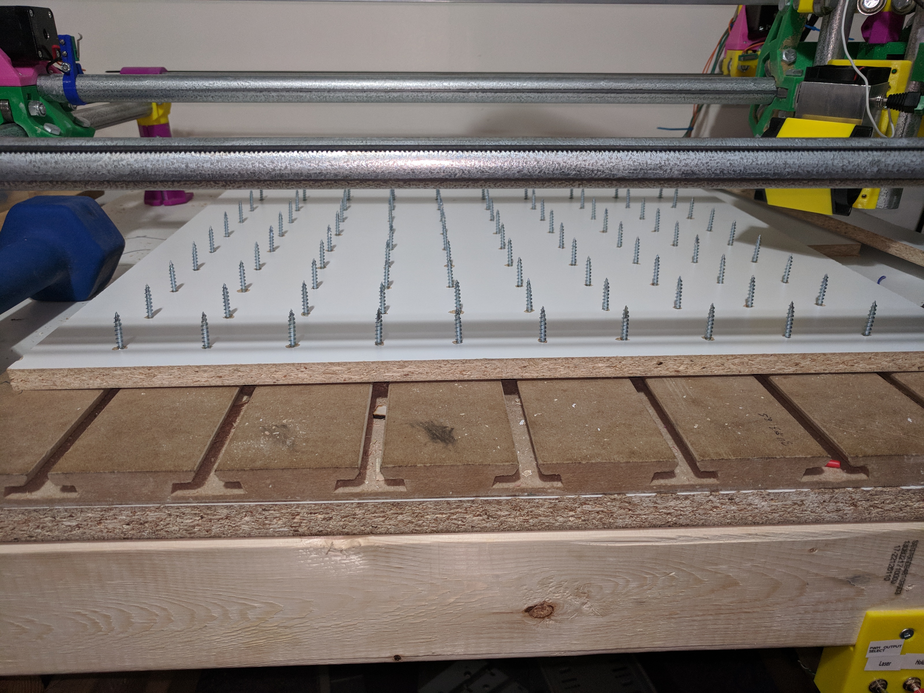 Bed of nails to support workpiece
